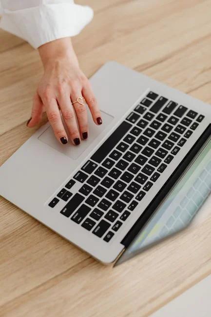 A close-up shot of a laptop showing a search engine results page.
